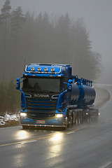 Image showing Blue Scania R580 Tank Truck on Foggy Road, Vertical View