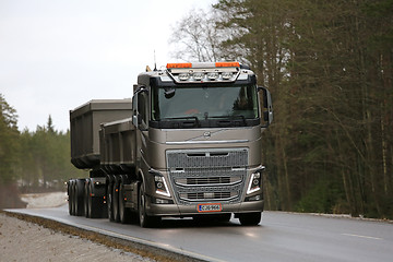 Image showing Bronze Volvo FH16 Combination Truck Hauls Limestone