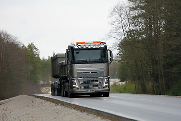 Image showing Bronze Volvo FH16 650 Combination Truck on the Road