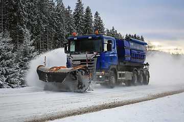 Image showing Scania Truck Equipped with Snowplow Clears Highway