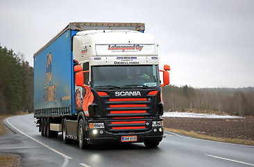 Image showing Colorful Scania V8 Semi on Rural Road