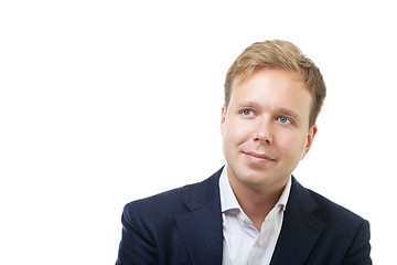 Image showing Portrait of a dreamy businessman on white background