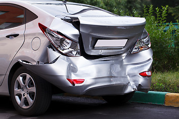 Image showing Big dent on car