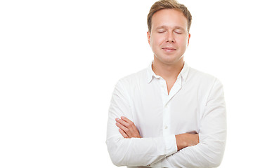 Image showing Young man with closed eyes isolated on white