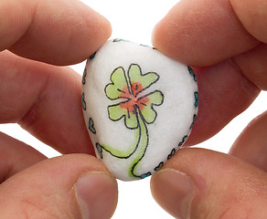 Image showing Stone with drawing of a clover four and small hearts