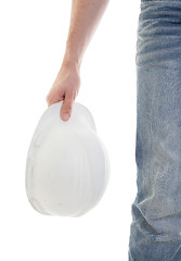 Image showing Male engineer in jeans holding white hardhat