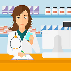 Image showing Pharmacist taking notes.