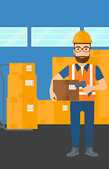 Image showing Worker checking barcode on box.