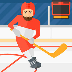 Image showing Ice-hockey player with stick.