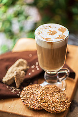 Image showing coffee latte cup with cookies