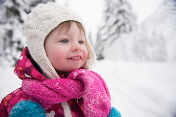 Image showing little girl have fun at snowy winter day