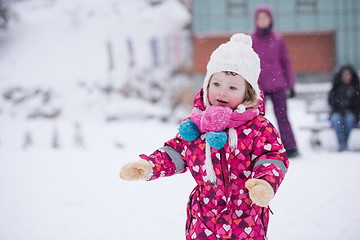 Image showing little girl have fun at snowy winter day