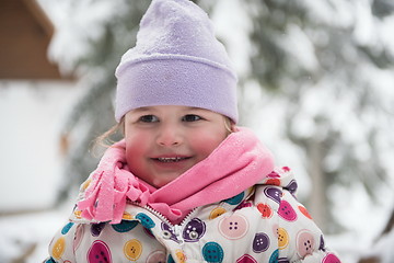 Image showing little girl have fun at snowy winter day