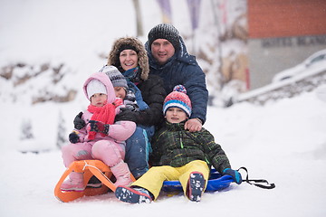 Image showing children group  having fun and play together in fresh snow