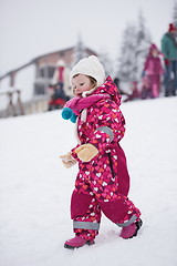 Image showing little girl have fun at snowy winter day