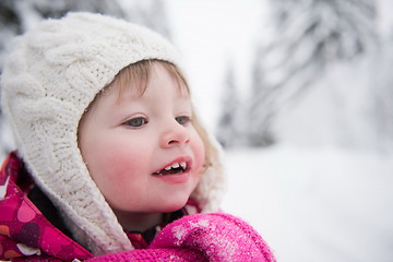 Image showing little girl have fun at snowy winter day