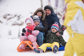 Image showing children group  having fun and play together in fresh snow