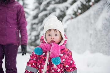 Image showing little girl have fun at snowy winter day