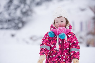 Image showing little girl have fun at snowy winter day