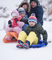 Image showing children group  having fun and play together in fresh snow