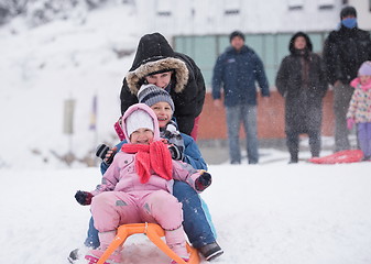 Image showing children group  having fun and play together in fresh snow