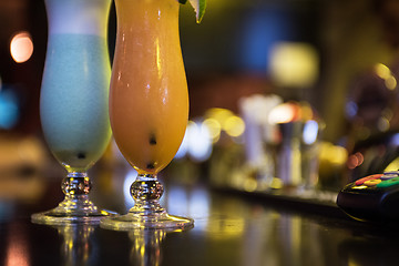 Image showing cocktails on bar background