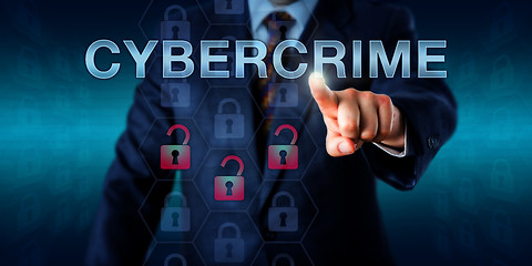 Image showing Crime Investigator Pushing CYBERCRIME\r