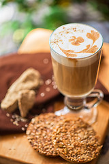 Image showing coffee latte cup with cookies