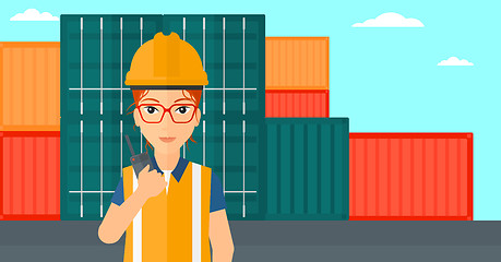 Image showing Stevedore standing on cargo containers background.