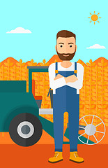 Image showing Man standing with combine on background.