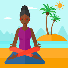 Image showing Woman meditating in lotus pose.