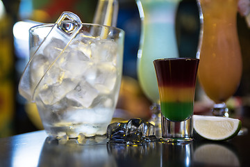 Image showing cocktails on bar background