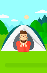 Image showing Man lying in tent.