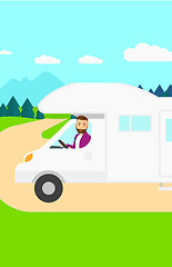 Image showing Man driving motor home.