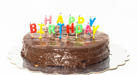 Image showing Chocolate happy birthday cake on silver tray towards white