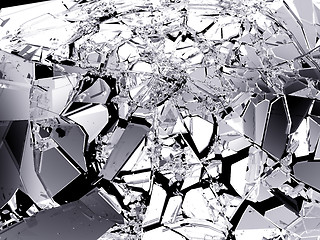 Image showing Sharp Pieces of shattered glass on black