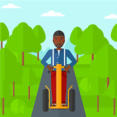 Image showing Man riding on electric scooter.
