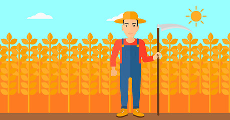 Image showing Farmer on the field with scythe.