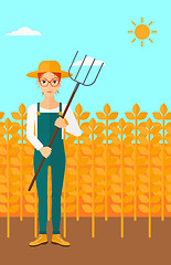 Image showing Farmer with pitchfork.