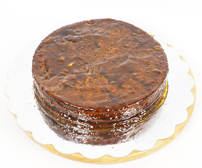 Image showing Half stage on sacher torte chocolate cake on silver mirror plate