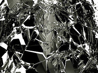 Image showing Pieces of Broken Shattered black glass isolated on white