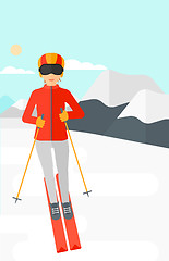 Image showing Young woman skiing.