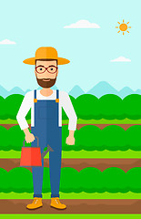 Image showing Farmer with watering can.