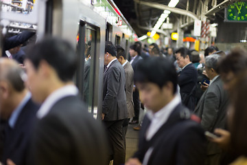 Image showing Passengers traveling by Tokyo metro.