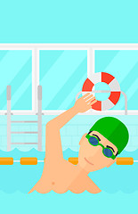 Image showing Swimmer training in pool.