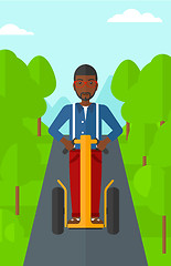 Image showing Man riding on electric scooter.