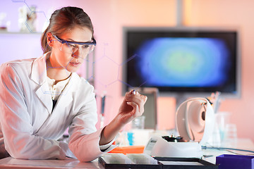 Image showing Life science researcher working in laboratory.