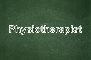 Image showing Healthcare concept: Physiotherapist on chalkboard background