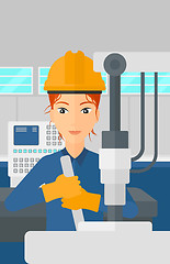 Image showing Woman working with industrial equipment.