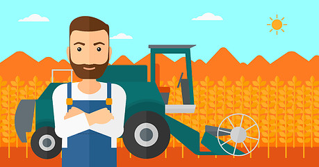 Image showing Man standing with combine on background.